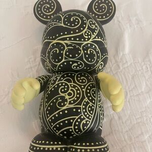 Disney Black and Yellow Swirl Figure